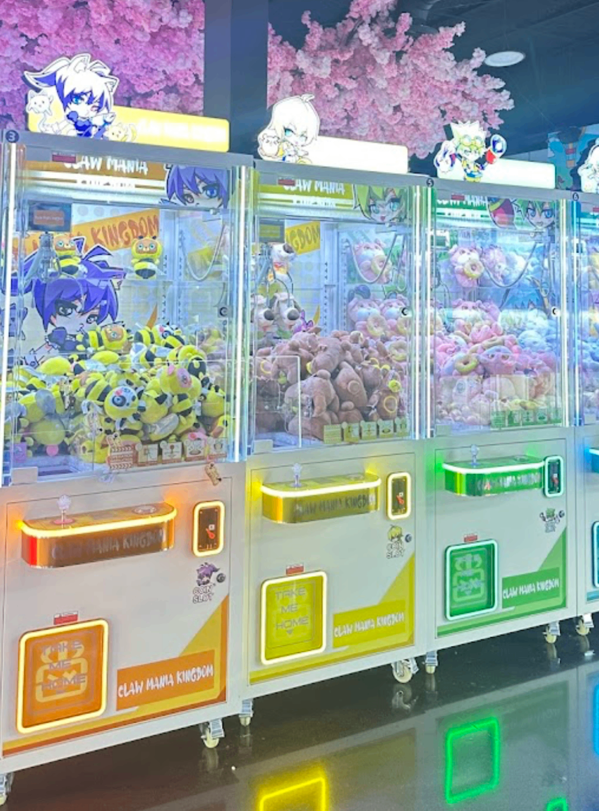 Rows of Klaw Kingdom claw machines packed with plushies